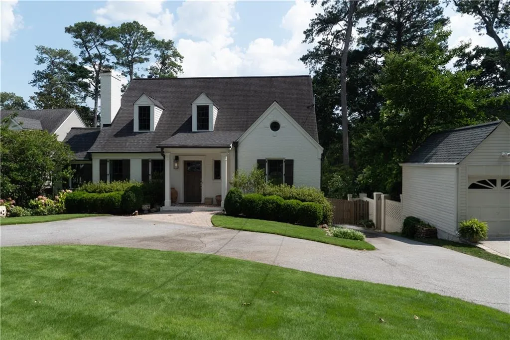 SHOWSTOPPER!  Classic 1939 CHARMER with fantastic curb appeal.  A welcoming circular drive greets you.