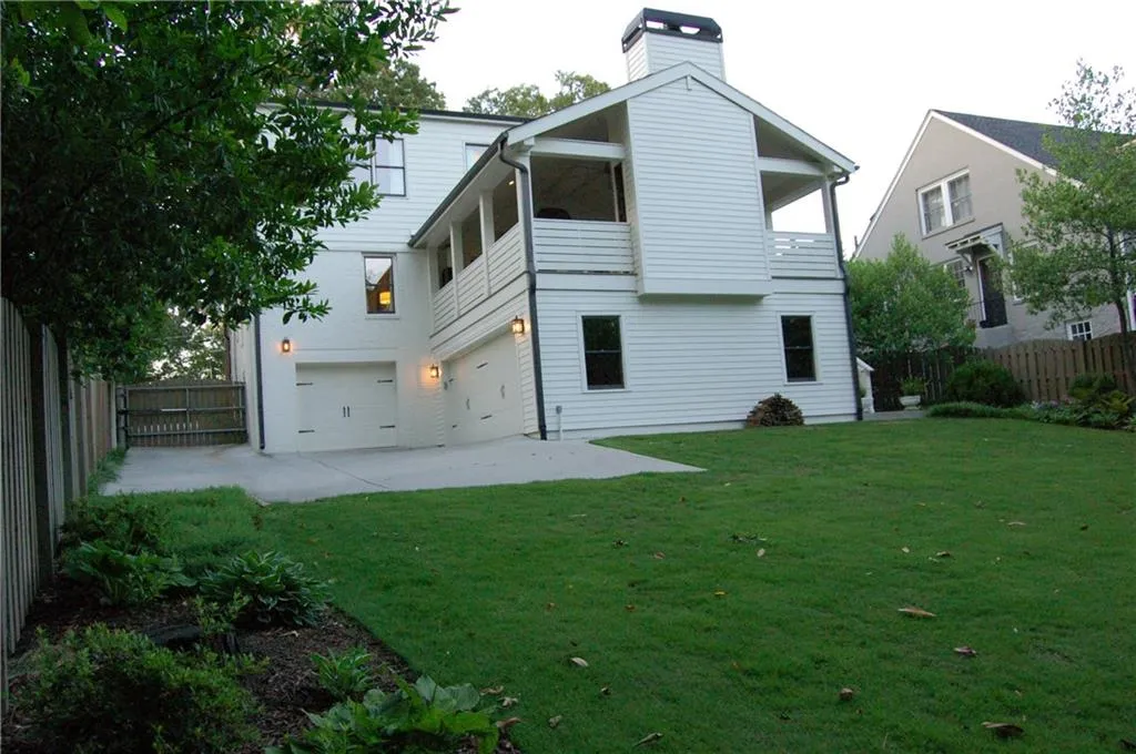 2 car garage plus additional single car garage all behind a gated/electric fence.