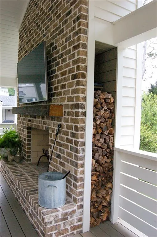 Thoughtfully designed wood storage on each side of fireplace!
