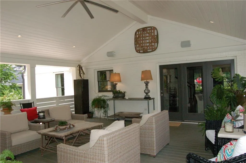 You will absolutely LOVE this expanded living space.  Adjacent & not shown is an open air grilling deck.