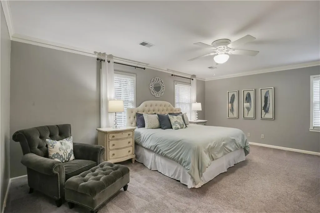 Primary Suite (hardwoods under the carpet).