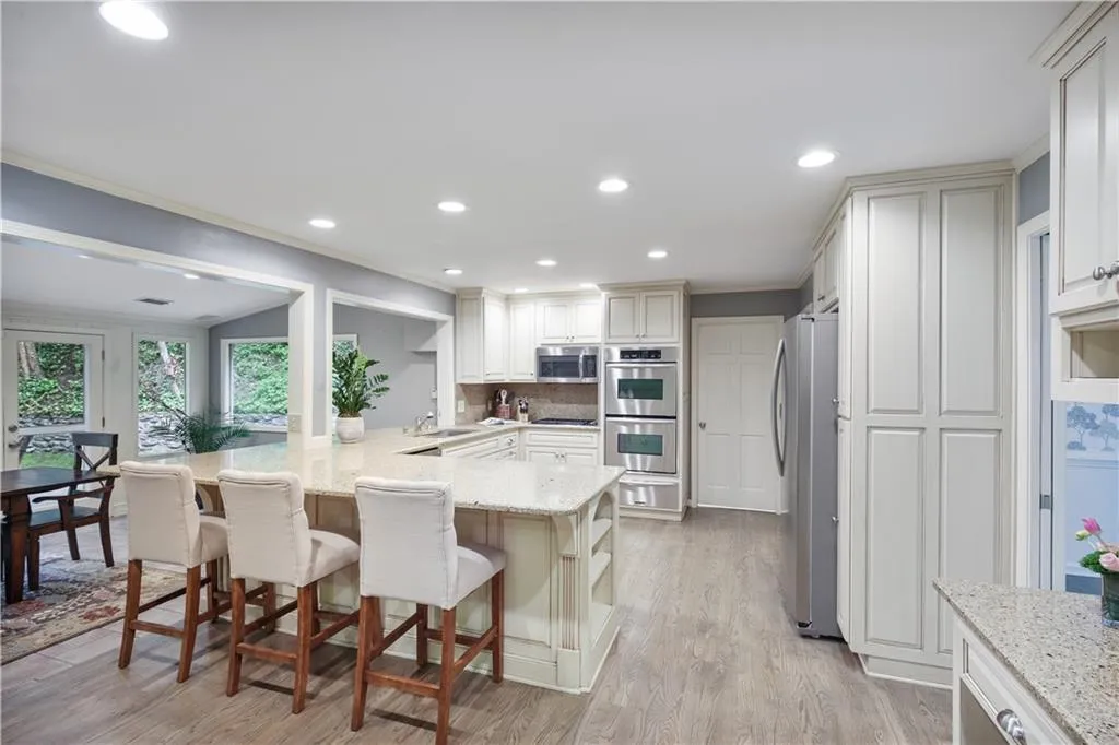 An incredible amount of storage and workspace in this kitchen.