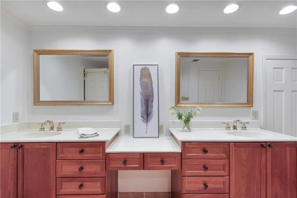 Bathroom large vanity and separate shower and whirlpool tub