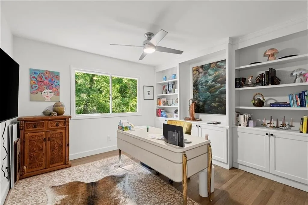 Bedroom made into an office with built-ins