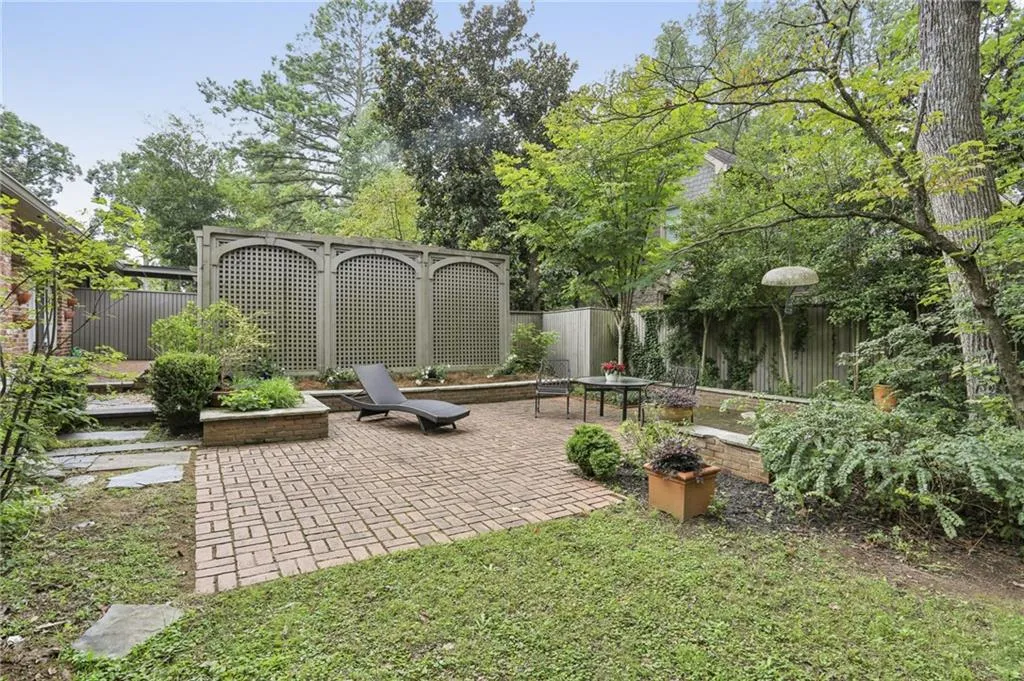 The terrace has been professionally designed with brick boarder walls.
