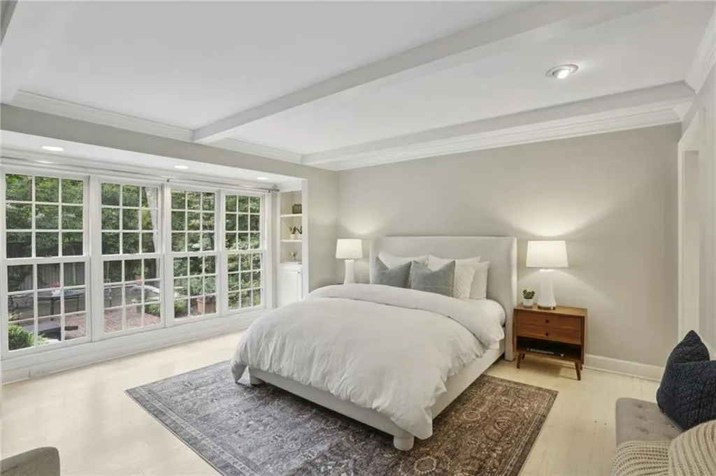 Your own private spa retreat to a nature sanctuary! The wall of windows adorns the room. A balance of evening recessed lighting, natural light and nature. Truly a restful space.