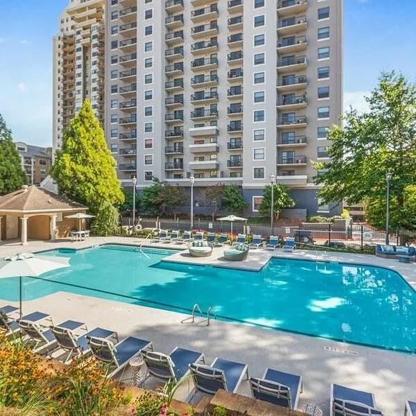 Community pool featuring a patio