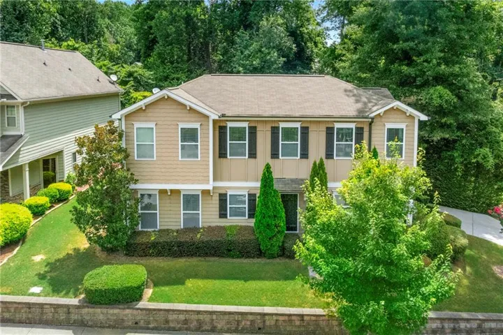 Welcome home! Enjoy your superb landscaping as you arrive.