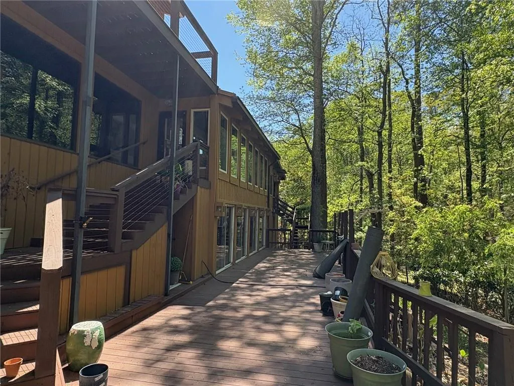 Wooden terrace featuring stairs