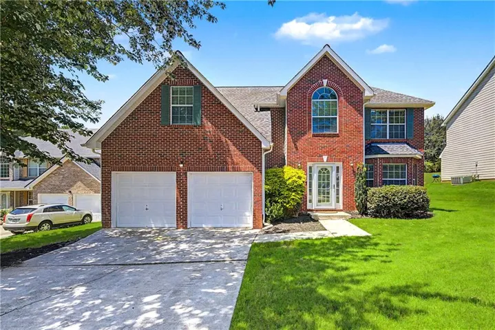 Brick exterior with a gabled roofline