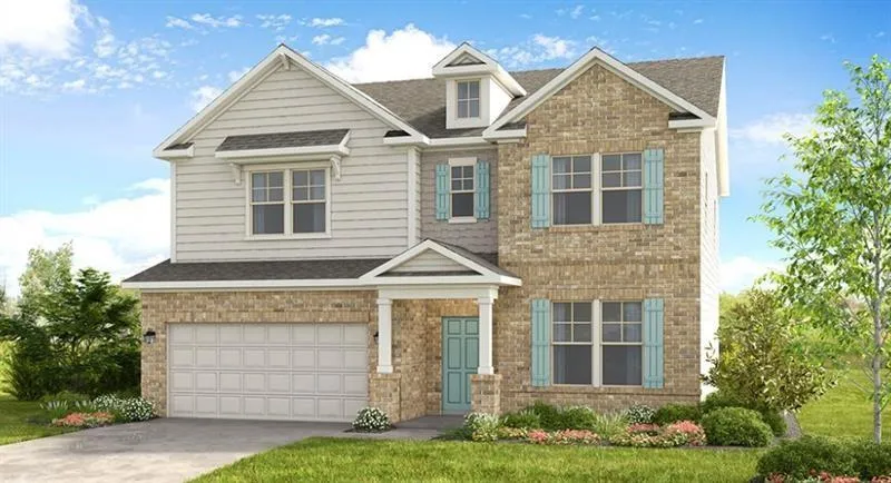 Two-story exterior featuring a mix of brick and siding, a two-car garage, and a covered entry with columns