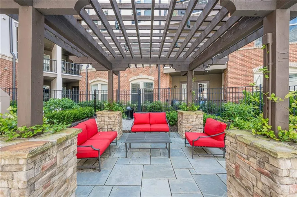 View of patio / terrace with a pergola and an outdoor living space