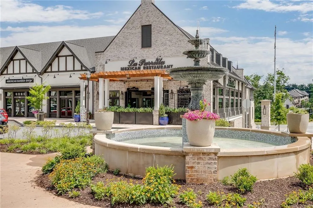 Surrounding community featuring a pergola and a patio area