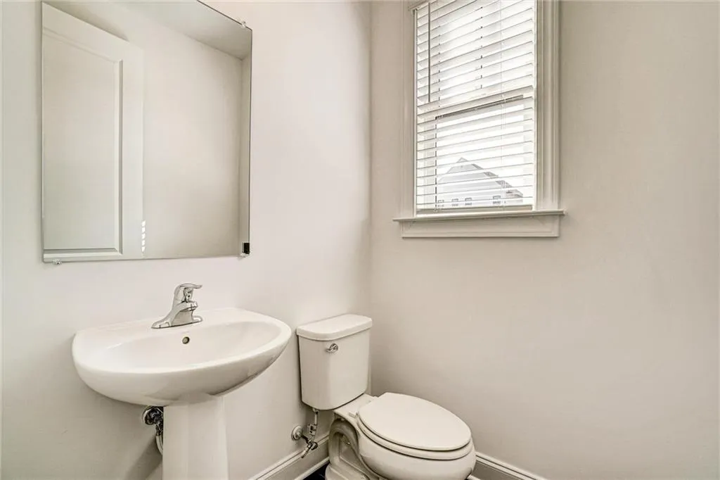 Half bath with baseboards