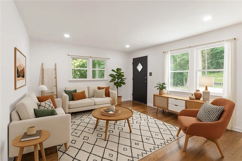 Living room featuring recessed lighting and wood finished floors