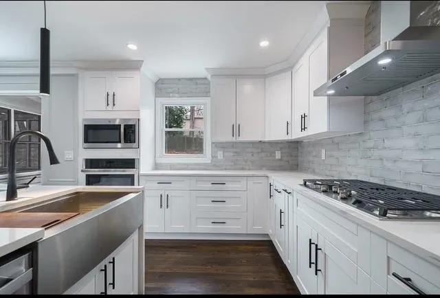 Deep Farmhouse sink, new gas stove, microwave included.