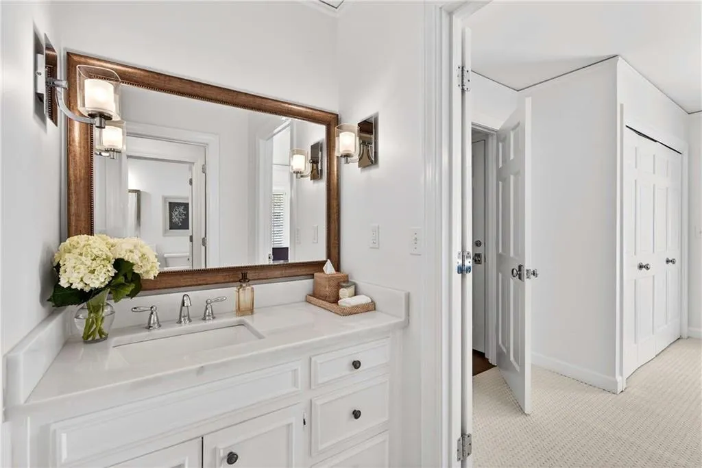 The updated bathrooms feature modern materials and tasteful finishes that bring a fresh, polished feel to the home.