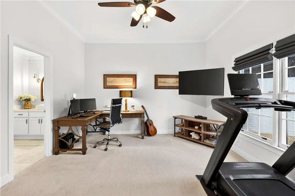 This terrace level daylight bedroom is a wonderful office or fitness area.