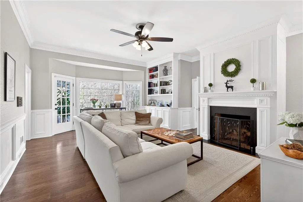 Built-in shelves provide both character and functionality, offering the perfect place to display books, art, and personal touches.