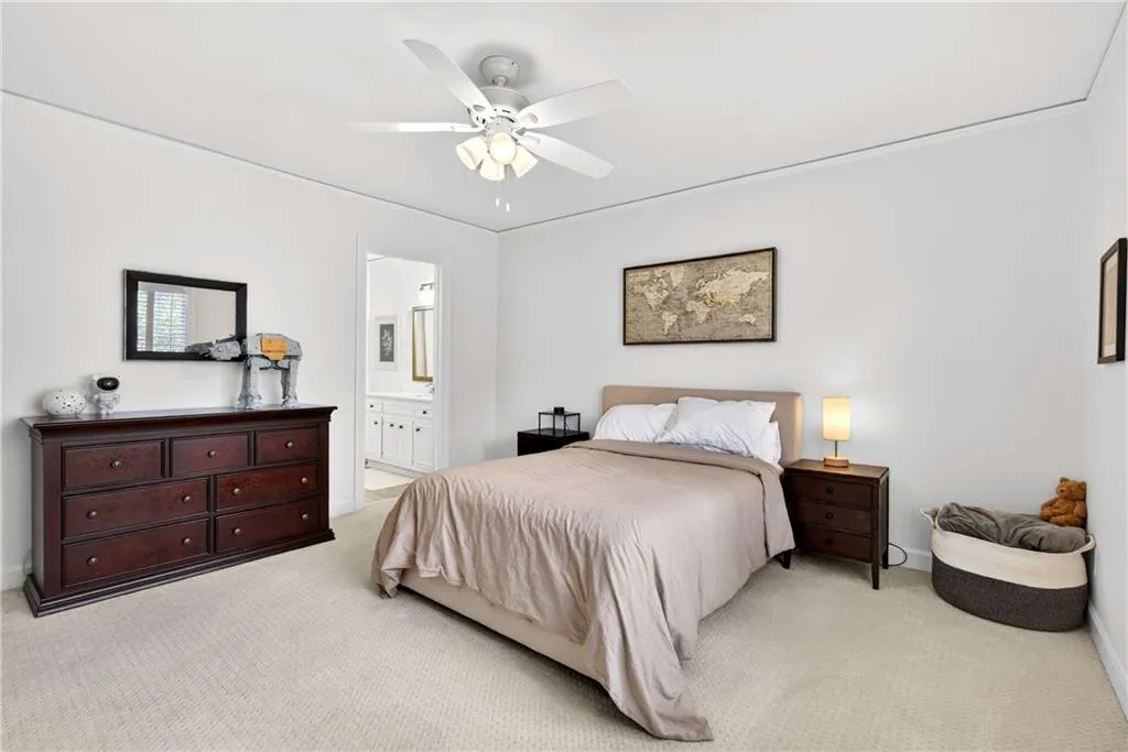 Each room feels inviting and airy, with plenty of space for family, guests, or a home office.