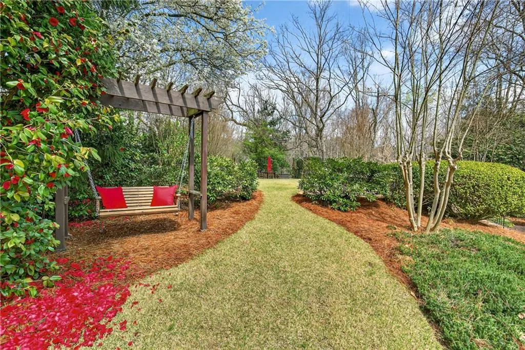 There are SO many beautiful, quiet and peaceful areas on this property to sit and enjoy.  This one might take the cake with the Camellia in bloom.