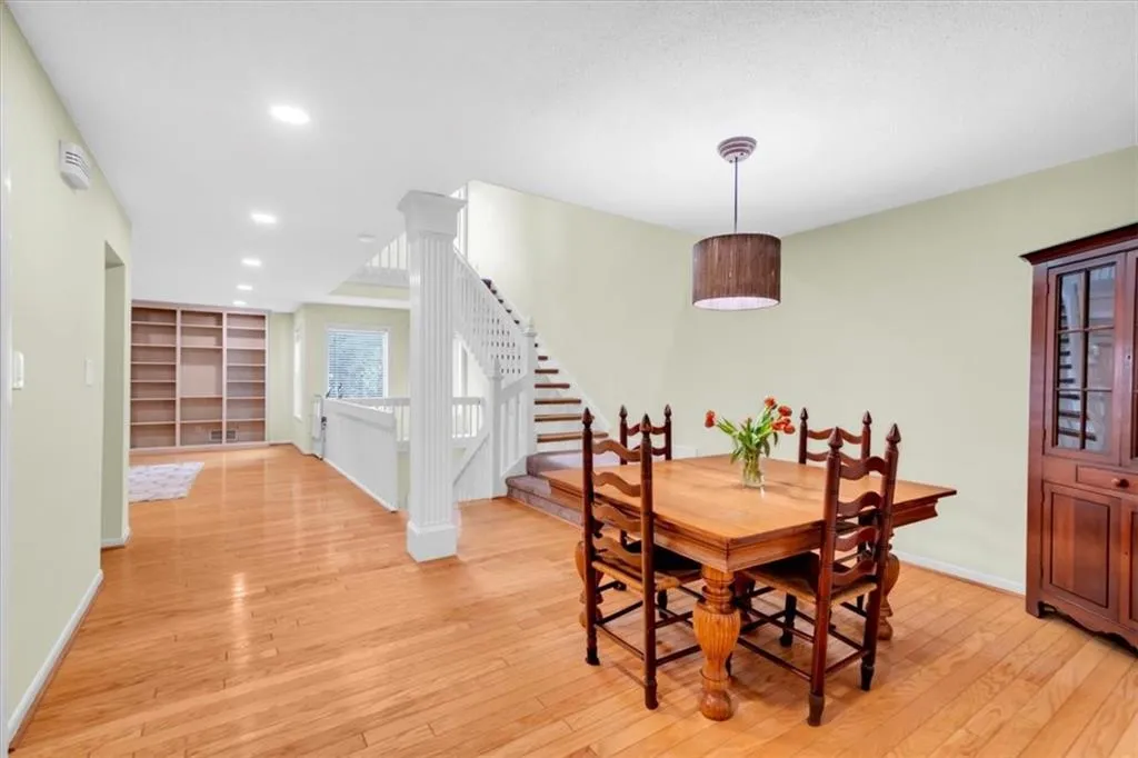 Dining area with light wood-type flooring