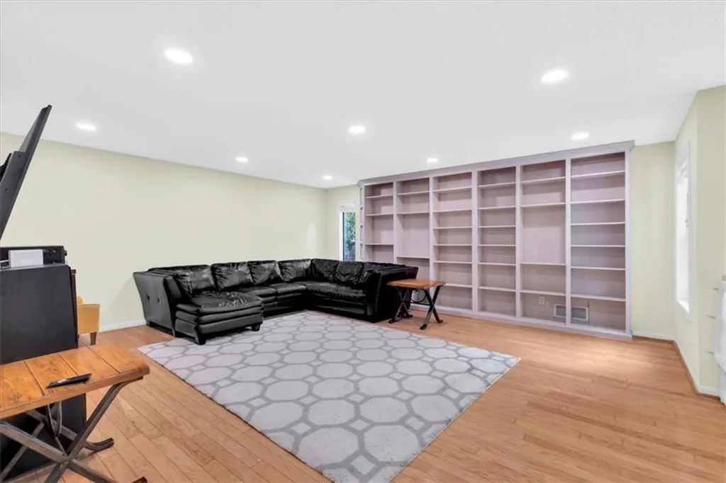 Living room featuring wood-type flooring