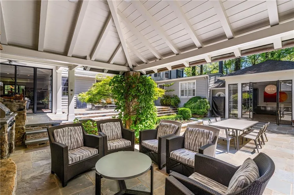 View of patio / terrace featuring a gazebo, an outdoor living space, and outdoor dining area
