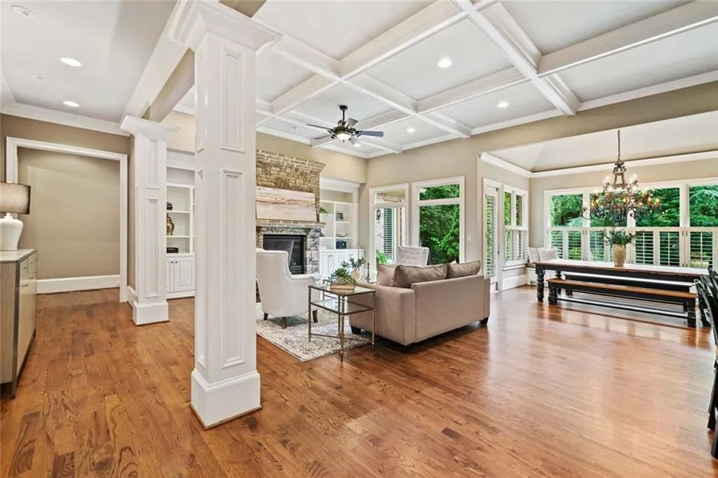 Open concept Family Room with coffered ceiling