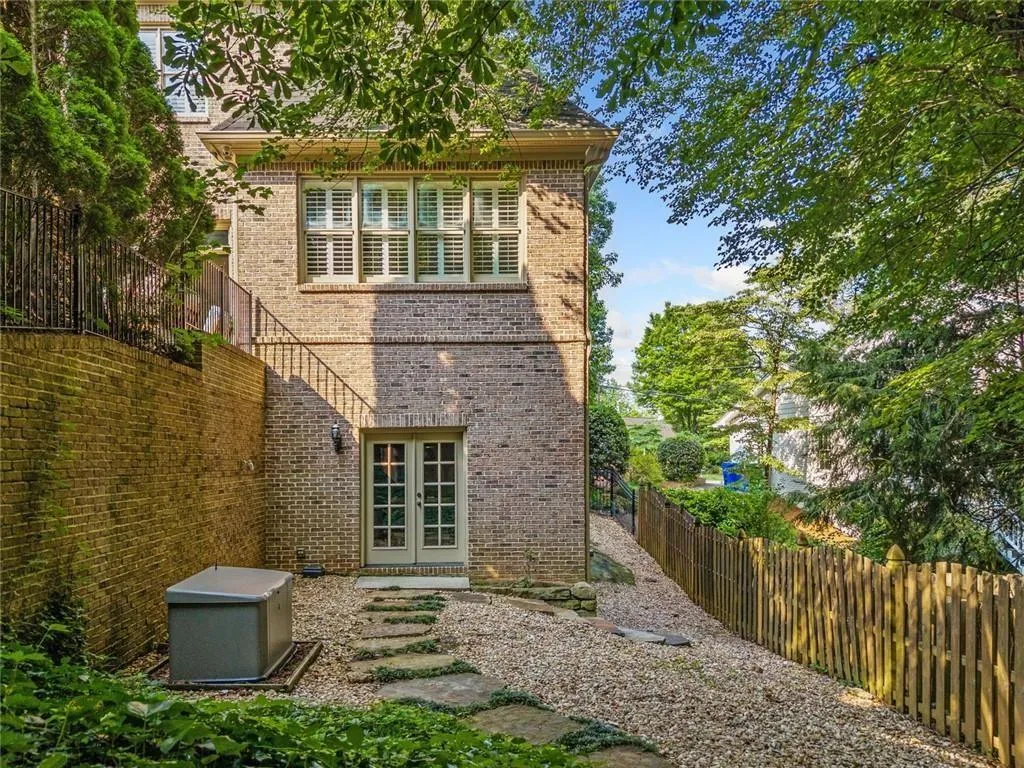 This home is thoughtfully equipped with a GE Whole House Generator which self-checks once a week and automatically powers up from natural gas with 8 seconds of electric power loss.