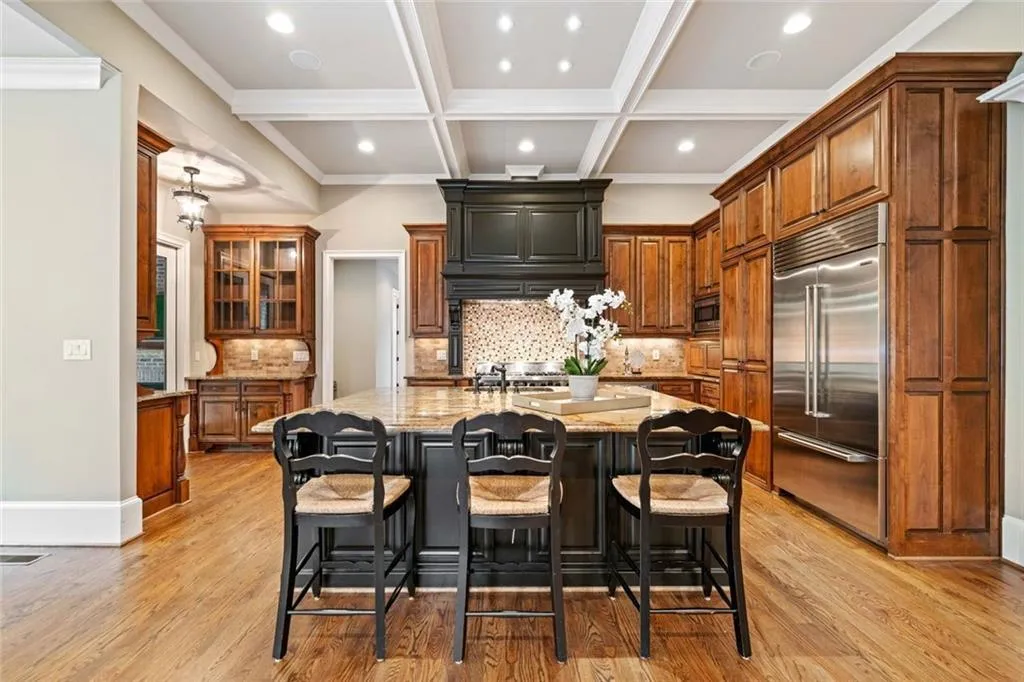 There are cabinets on this side of the island with custom made pull out shelving.