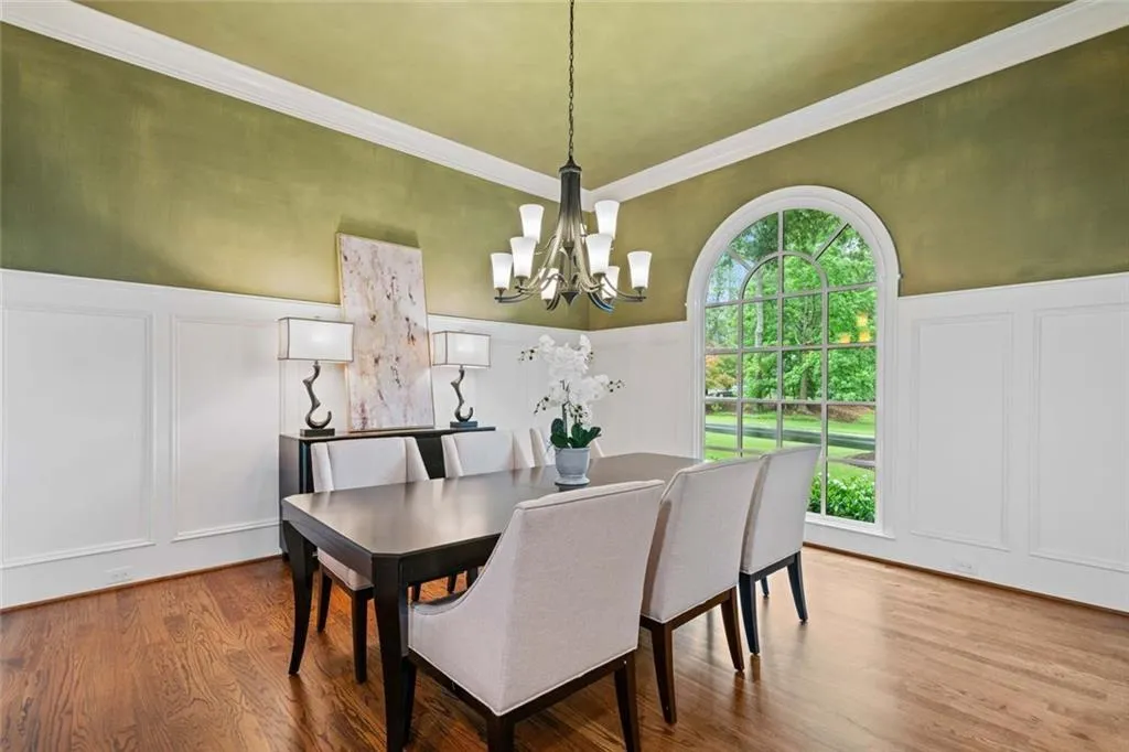 Formal Dining Room with elegant wainscotting