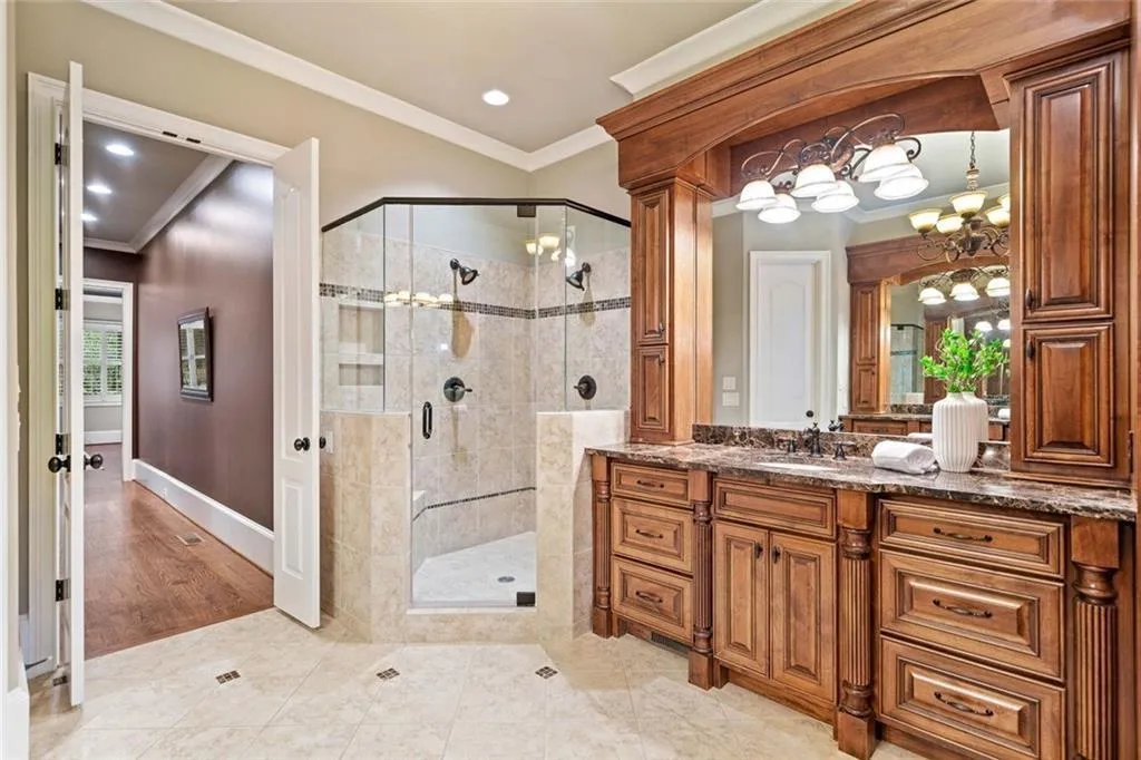 Dual shower heads and a separate water closet.