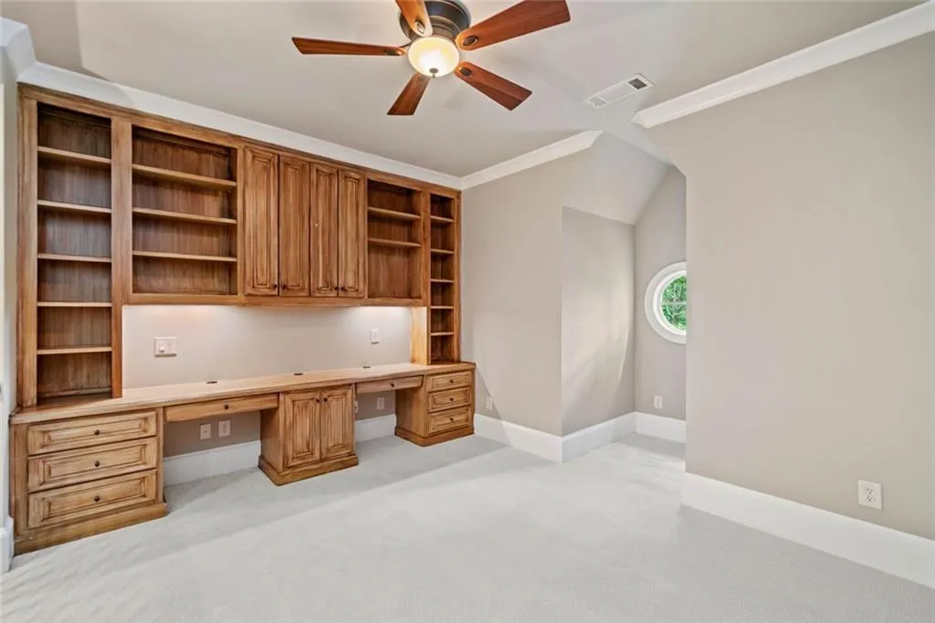 A versatile loft area serves as the perfect home office, study zone or playroom, complete with two built-in desks.