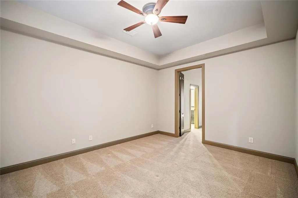 Another room on the terrace level offers a flexible space ideal for crafting, guests or a second home office with access to the shared bath and exterior entrance.