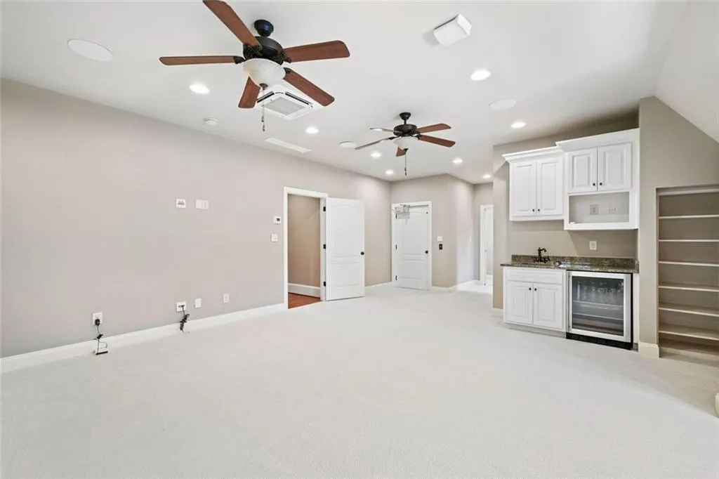Thoughtfully designed with elevator access to all levels from the garage. The space is climate-controlled with its own dedicated system, has Lutron-enabled recessed lighting and dual ceiling fans.