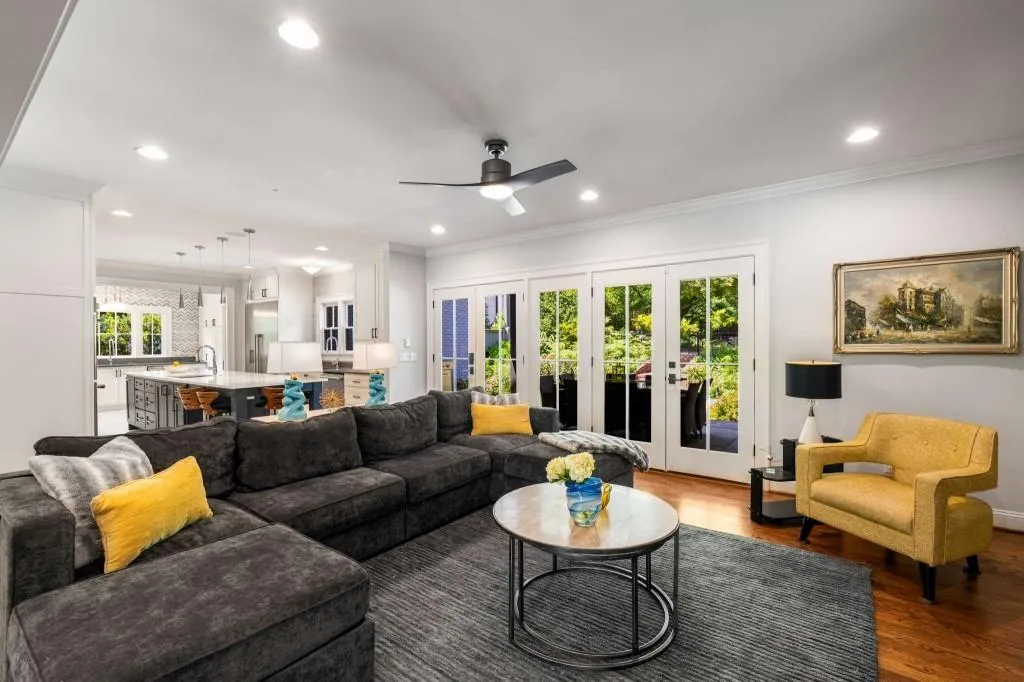 This oversize living space is in the heart of the home.  Working in the kitchen or hanging out on the patio - you are in the middle of it all.