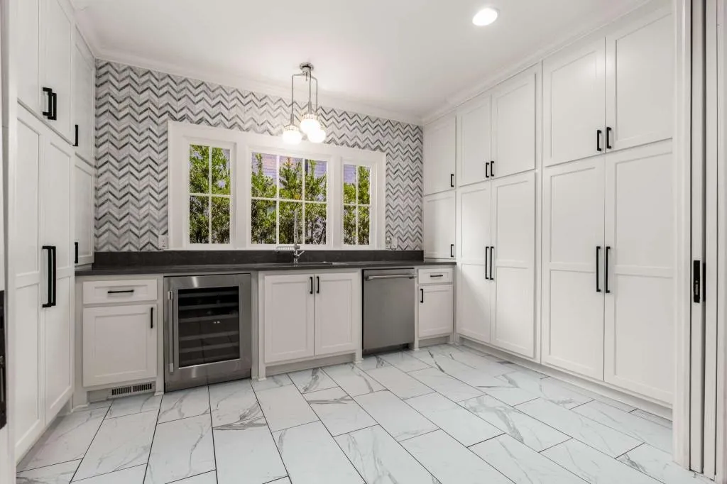 The scullery offers amazing storage, an additional dishwasher & sink.  Plus pocket doors to hid everything until you are ready to clean it up.