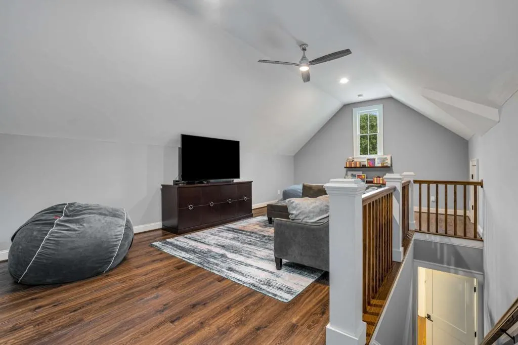 This top floor entertainment space is perfect for the kids to have their own space. Or make it the perfect media room!