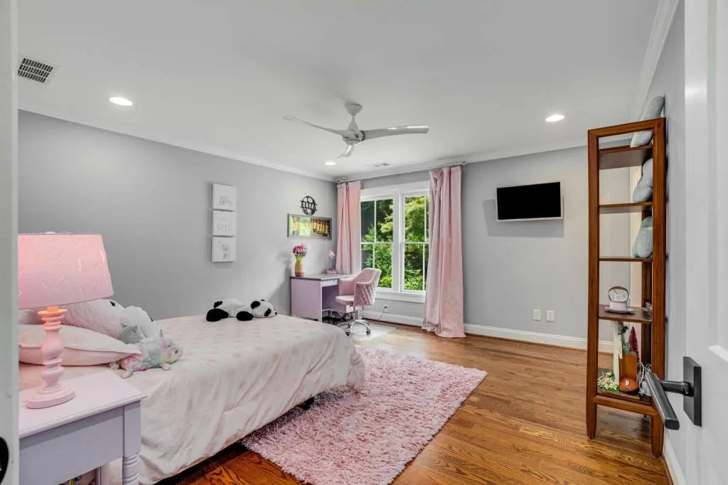 Additional bedroom with ensuite located on the upper level.