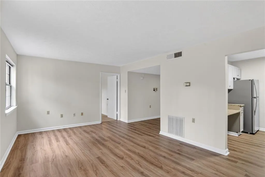 Empty room featuring light wood-style floors and baseboards