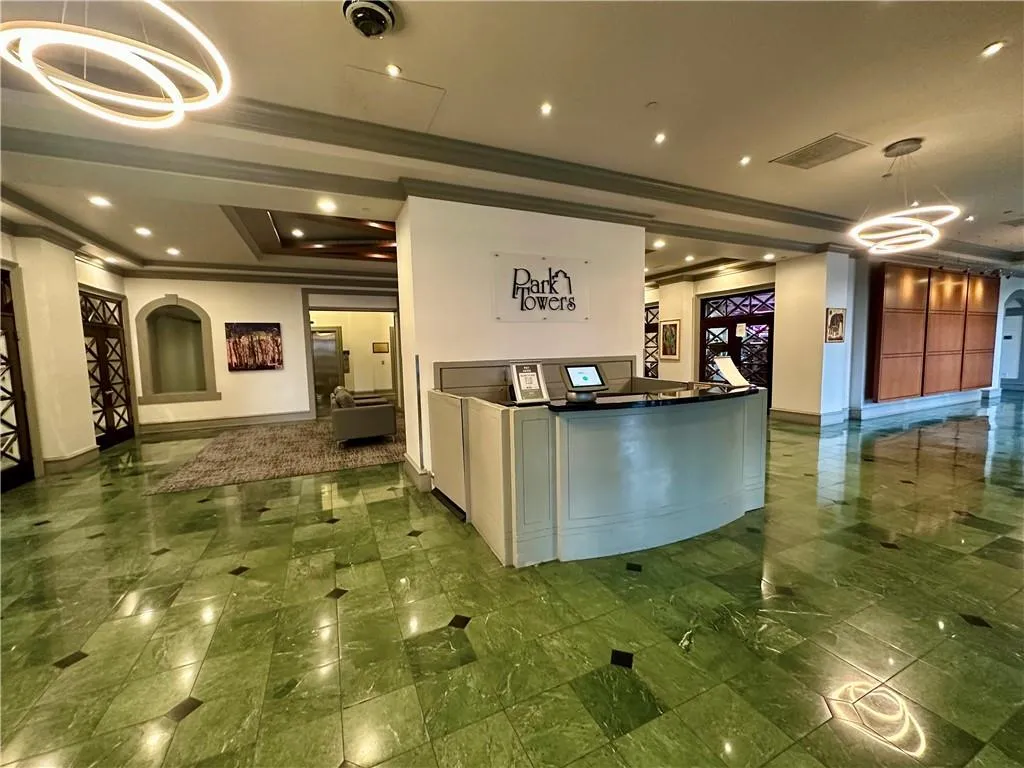Reception featuring recessed lighting and crown molding