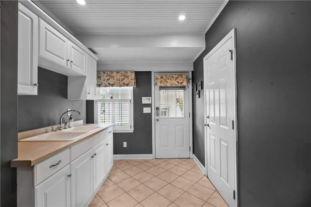 Mudroom, entry to breezeway and workshop