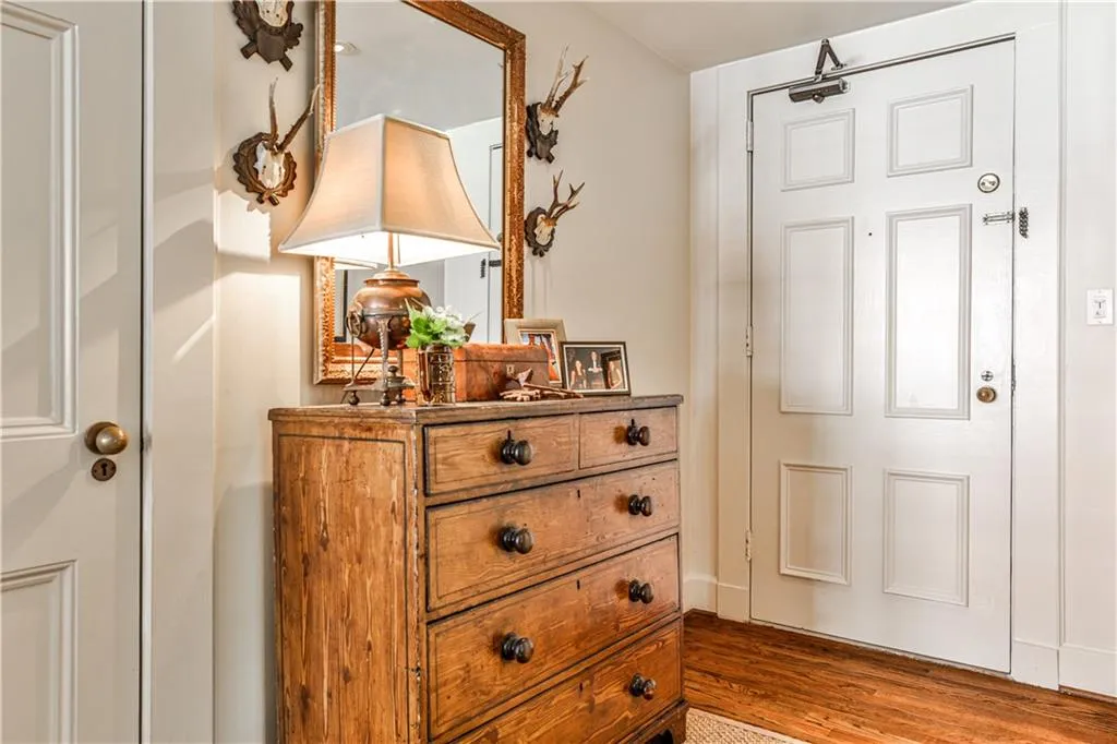 Foyer entrance featuring wood finished floors