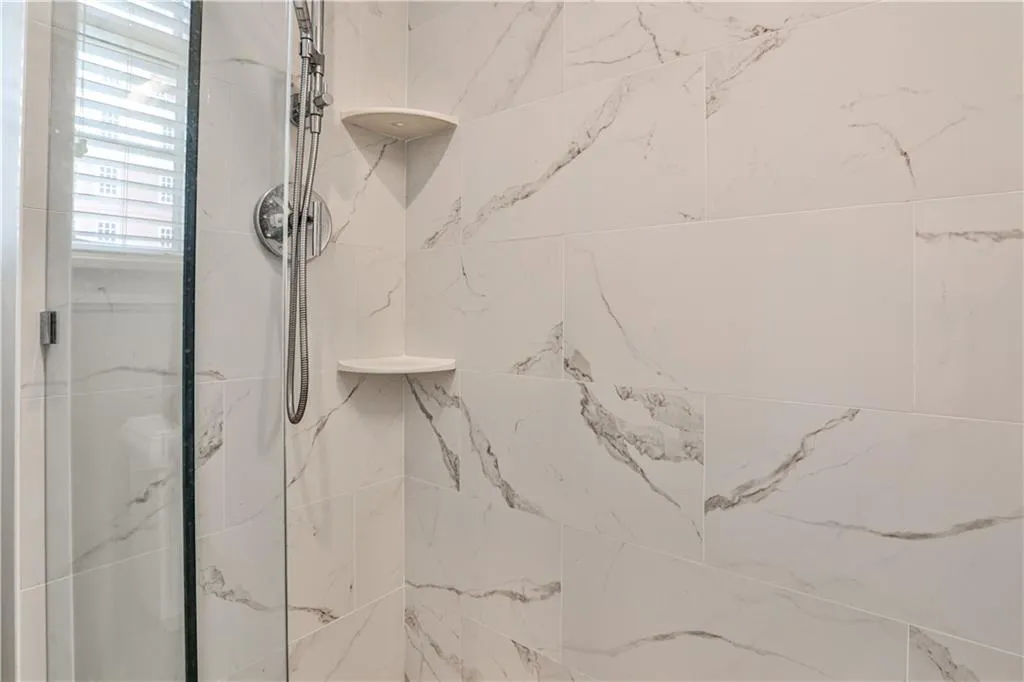 Detailed view of a marble finish shower