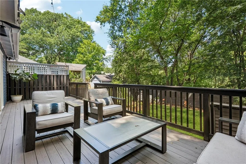 Wooden terrace featuring an outdoor living space