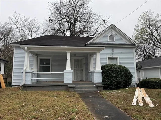 View of front of home featuring covered porch