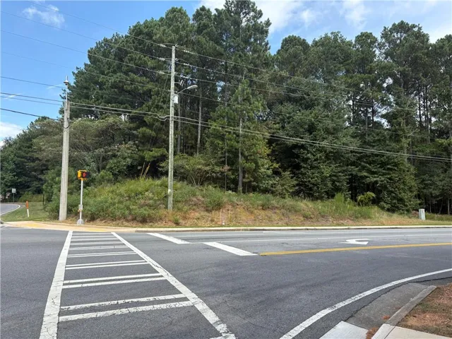 Wooded lot with mature trees and street frontage
