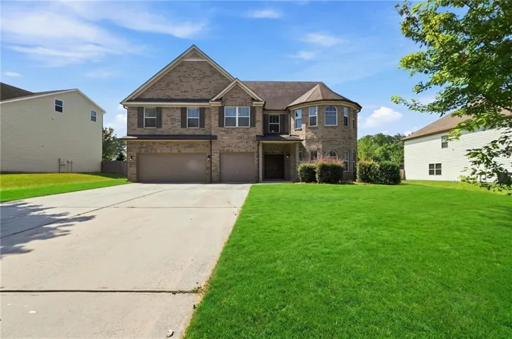 Brick facade with a multi-car garage