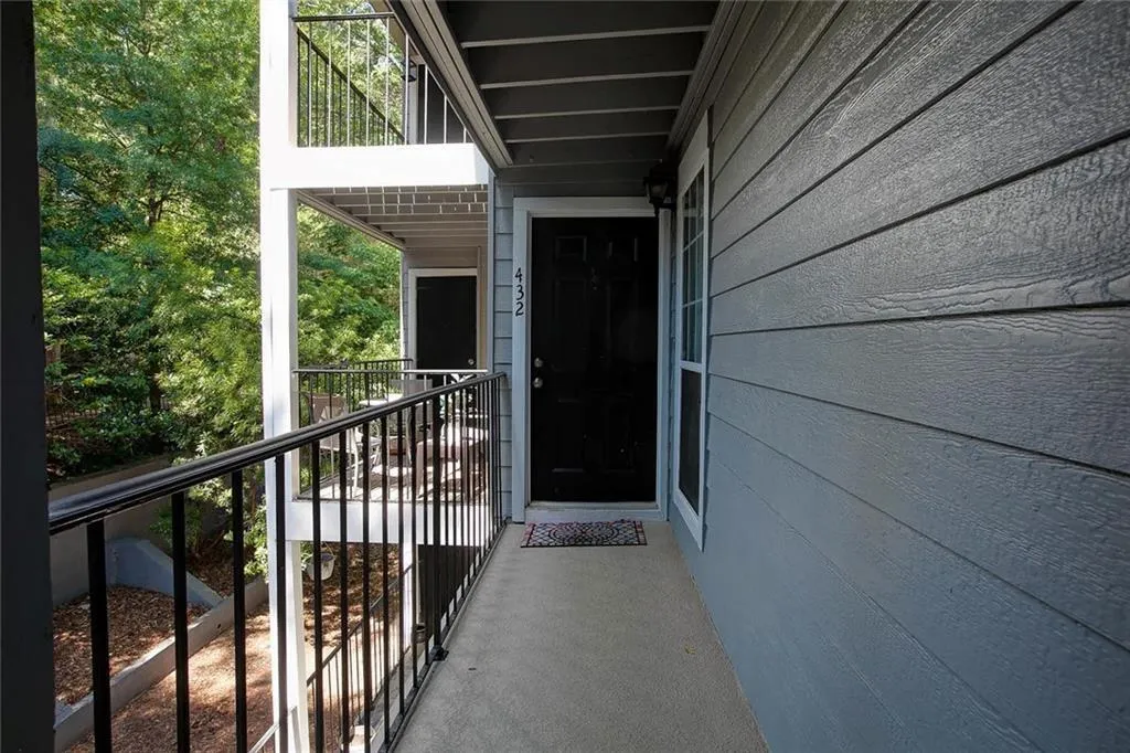 Doorway to property featuring a balcony